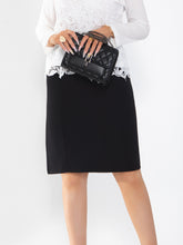 Women's midi skirt is fashionable and stylish, wrinkle free, with elastic pockets for office environment