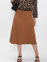 Women's midi skirt is fashionable and stylish, wrinkle free, with elastic pockets for office environment